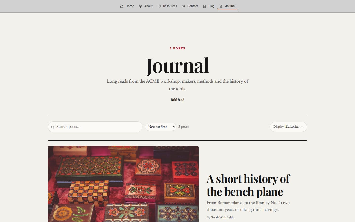 ACME's Journal as visitors see it: a serif masthead, a search box and a large feature post, A short history of the bench plane